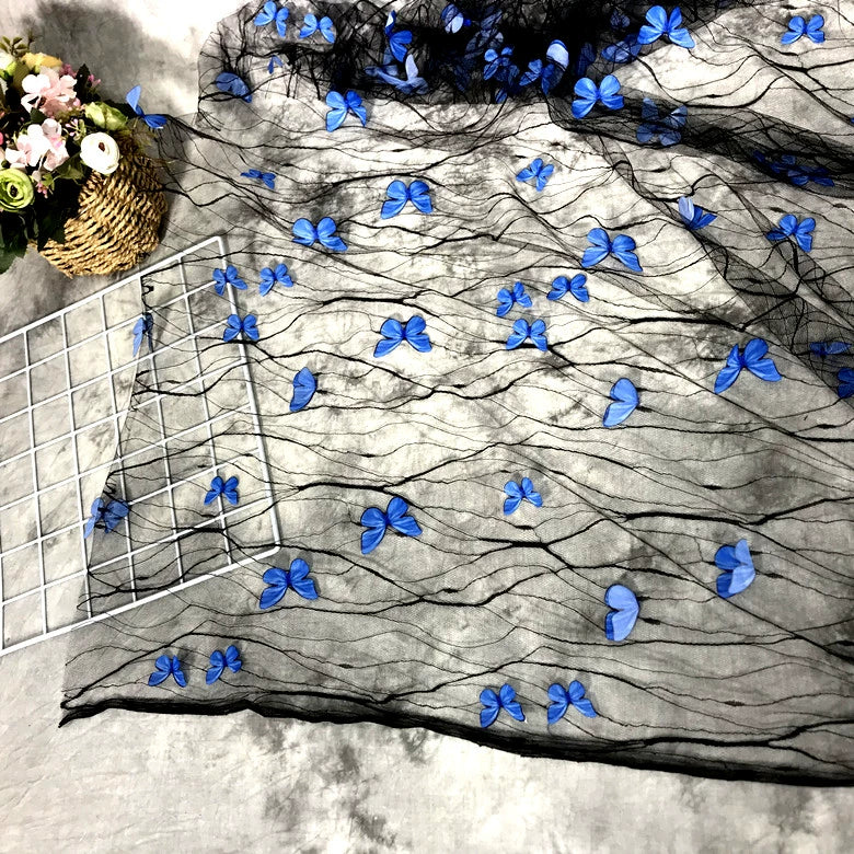 Tissu en maille de dentelle de fleur de papillon 3D bleu transparent noir